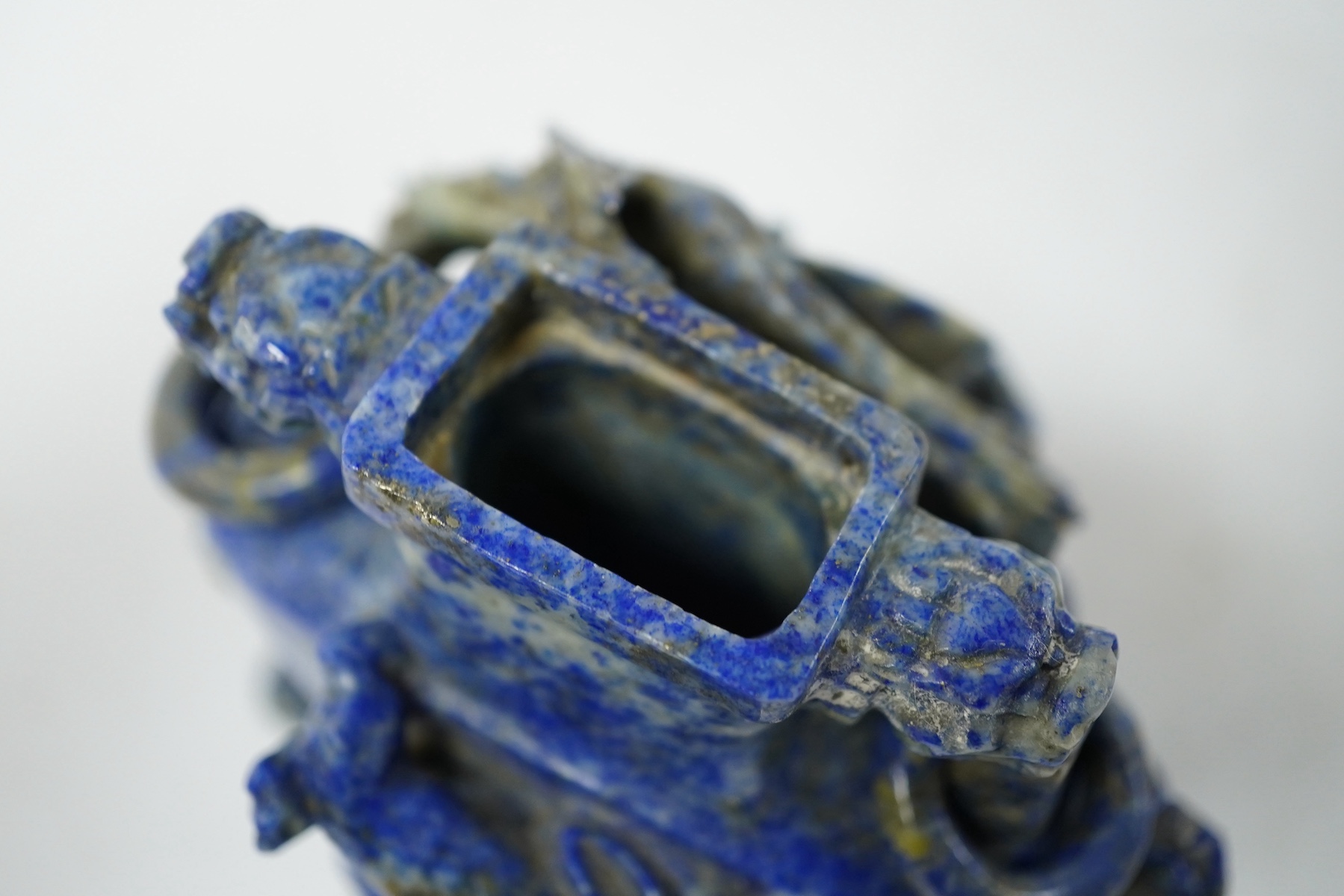 A Chinese lapis lazuli vase and cover, late 19th/early 20th century, 14cm high. Condition - fair, minor chips
